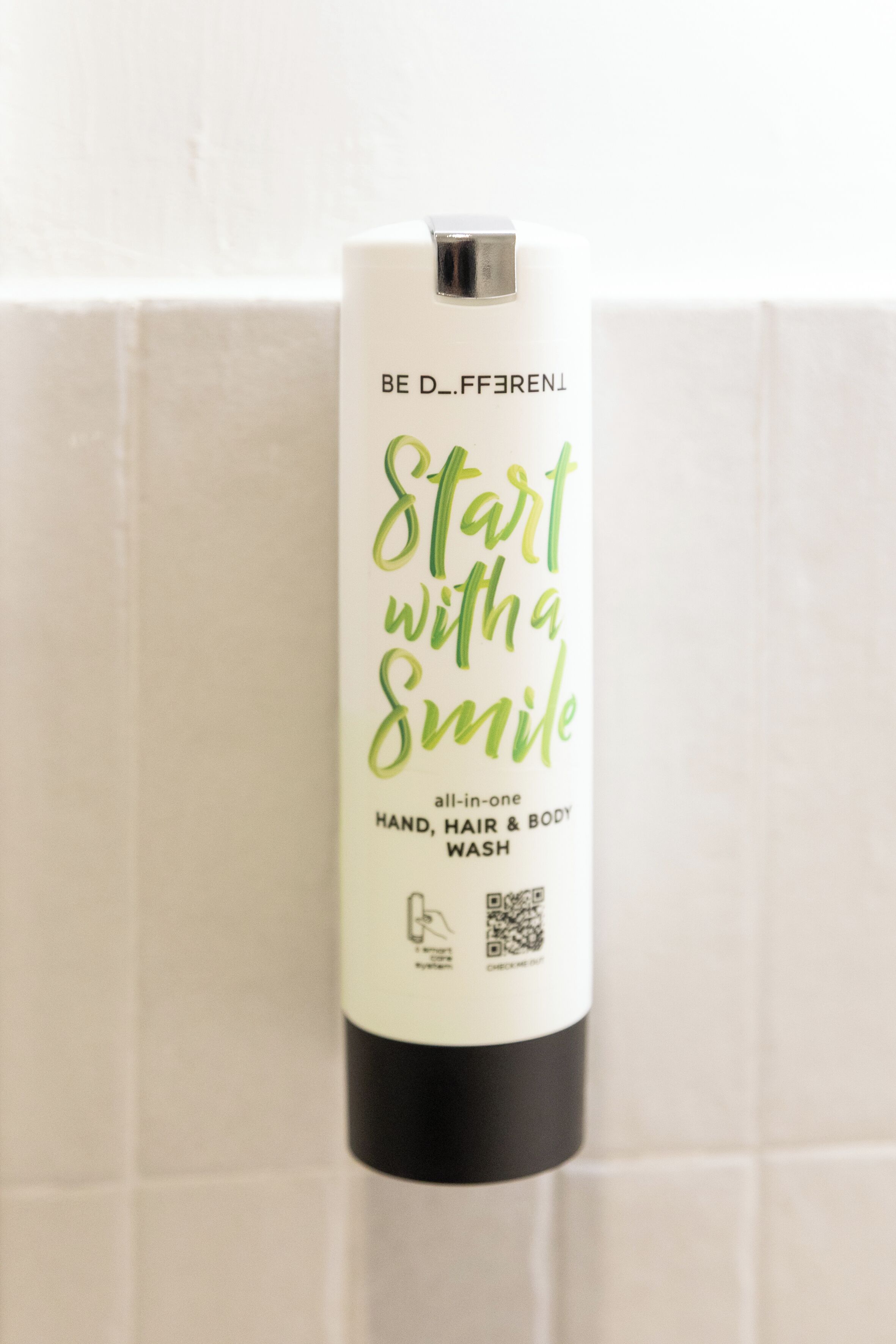 A bottle of hand, hair, and body wash.