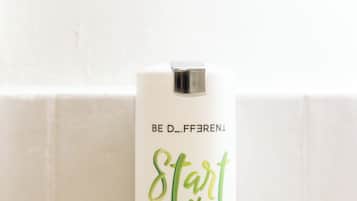 A bottle of hand, hair, and body wash.