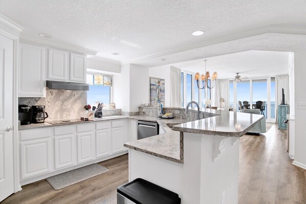 Fridge, microwave, cookware/dishes/utensils