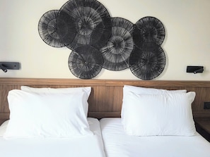 Premium bedding, pillowtop beds, desk, laptop workspace