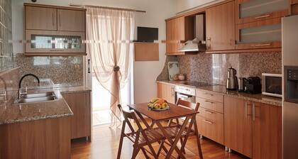 Voula Riviera Stylish Maisonette with Lush Garden, Near-Beach!