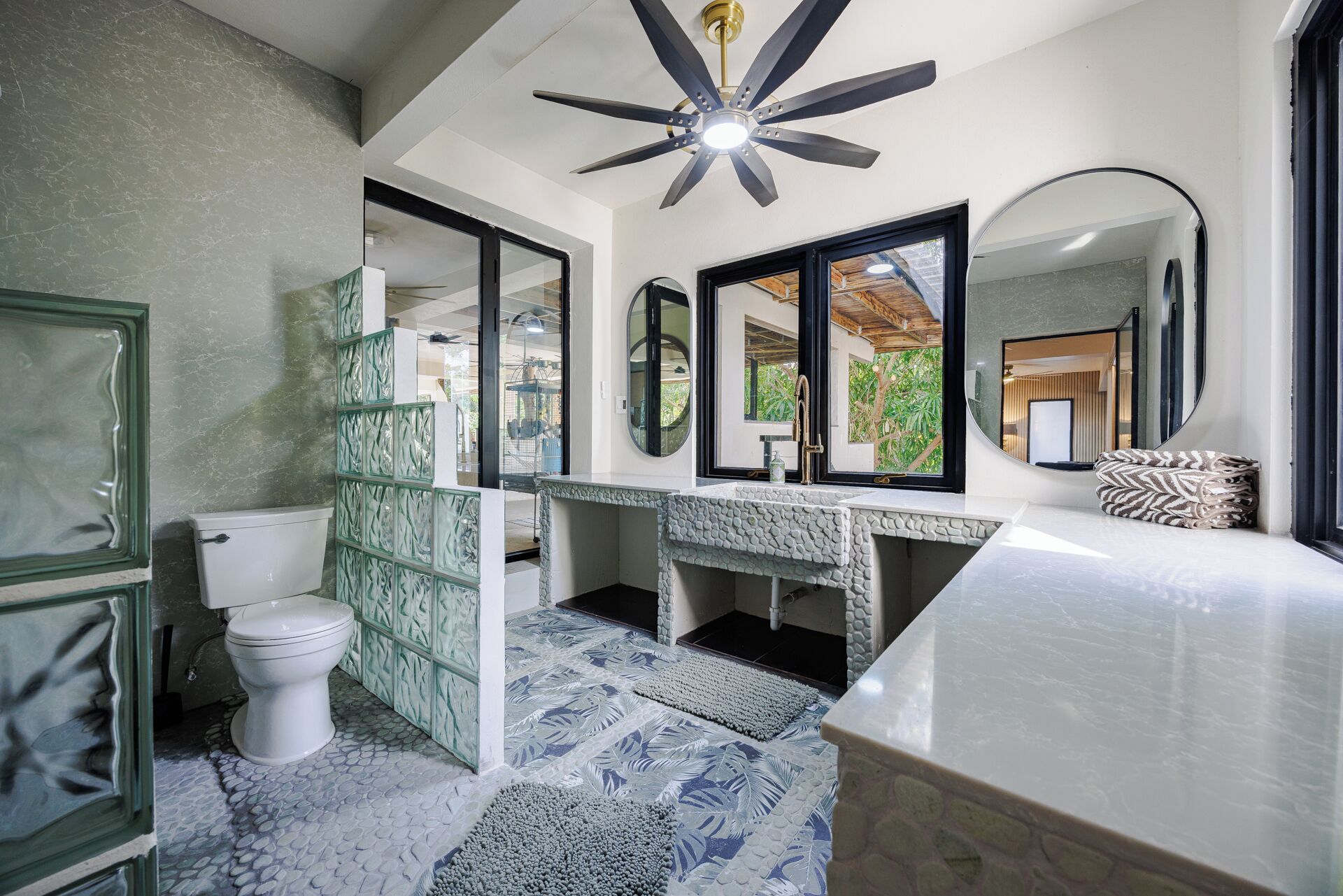 Huge Bathroom w Shower Accessible from Pool Area and Downstairs Guest Quarters. 