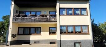 The modern vacation apartment is situated in a quiet location next to the local recreation area