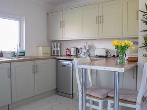 Oven, dishwasher, dining tables