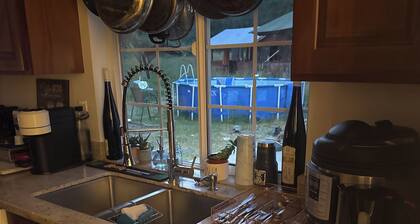 Charming 3-bedroom country house with game room and WiFi in peaceful Home.
