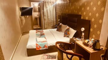 Classic Double Room, City View | Living area | TV
