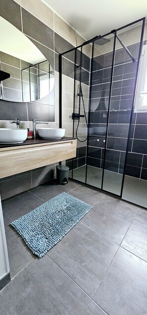 Shower, hair dryer, towels, soap