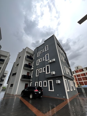 Stylish residential building with modern design, air conditioning and parking.