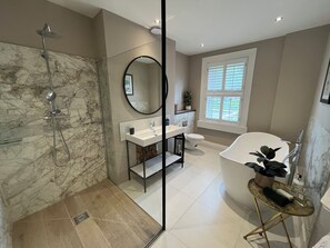 Shower, hair dryer, towels, soap