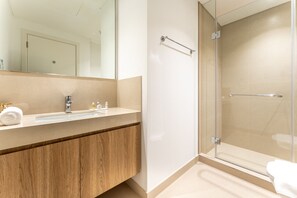Shower, hair dryer, towels, soap