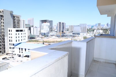 PrimeNest - 3 bedroom Apartment