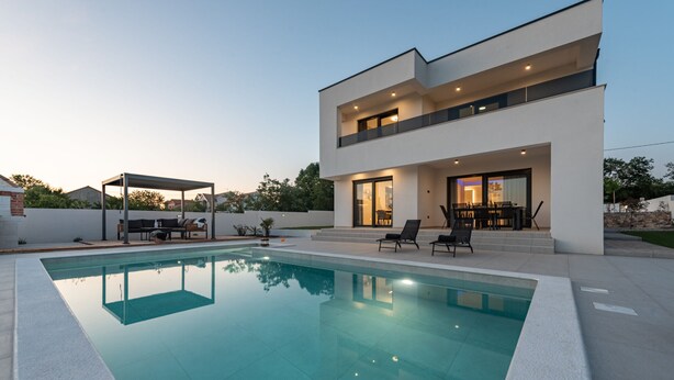 A modern two-story house with a swimming pool, outdoor seating, and a covered patio area. - Villa Roma Murvica Zadarvillas (Policnik)
