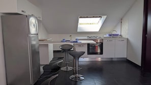 Fridge, microwave, stovetop, cookware/dishes/utensils