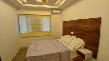 1 chambre, fer et planche Ă repasser, Wi-Fi, draps fournis