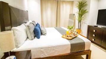 1 dormitorio, tabla de planchar con plancha, cuna de viaje y wifi