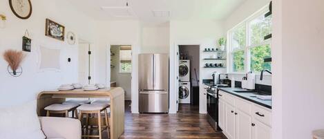 Fridge, stovetop, toaster, cookware/dishes/utensils