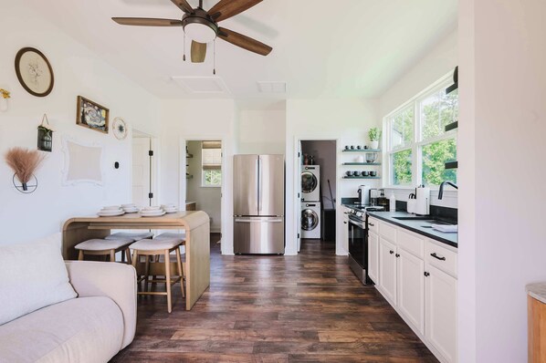 Fridge, stovetop, toaster, cookware/dishes/utensils