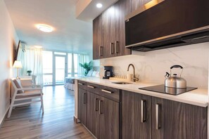 Fridge, microwave, stovetop, coffee/tea maker