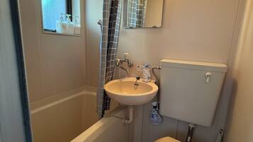 Eco-friendly toiletries, hair dryer, towels, soap