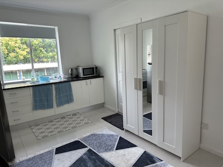 Private kitchen. Cozy and private one bedroom studio with double bed for couples or single