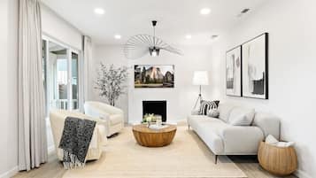 House (3 Bedrooms) | Living area | 43-inch flat-screen TV with cable channels, fireplace