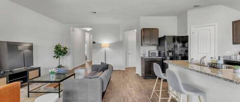 House (4 Bedrooms) | Living area | 43-inch flat-screen TV with cable channels, foosball