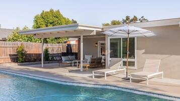 Outdoor pool, pool umbrellas, pool loungers