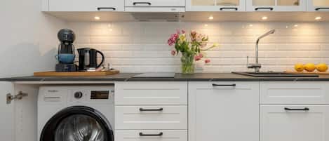 Coffee/tea maker, fridge, stovetop, dishwasher