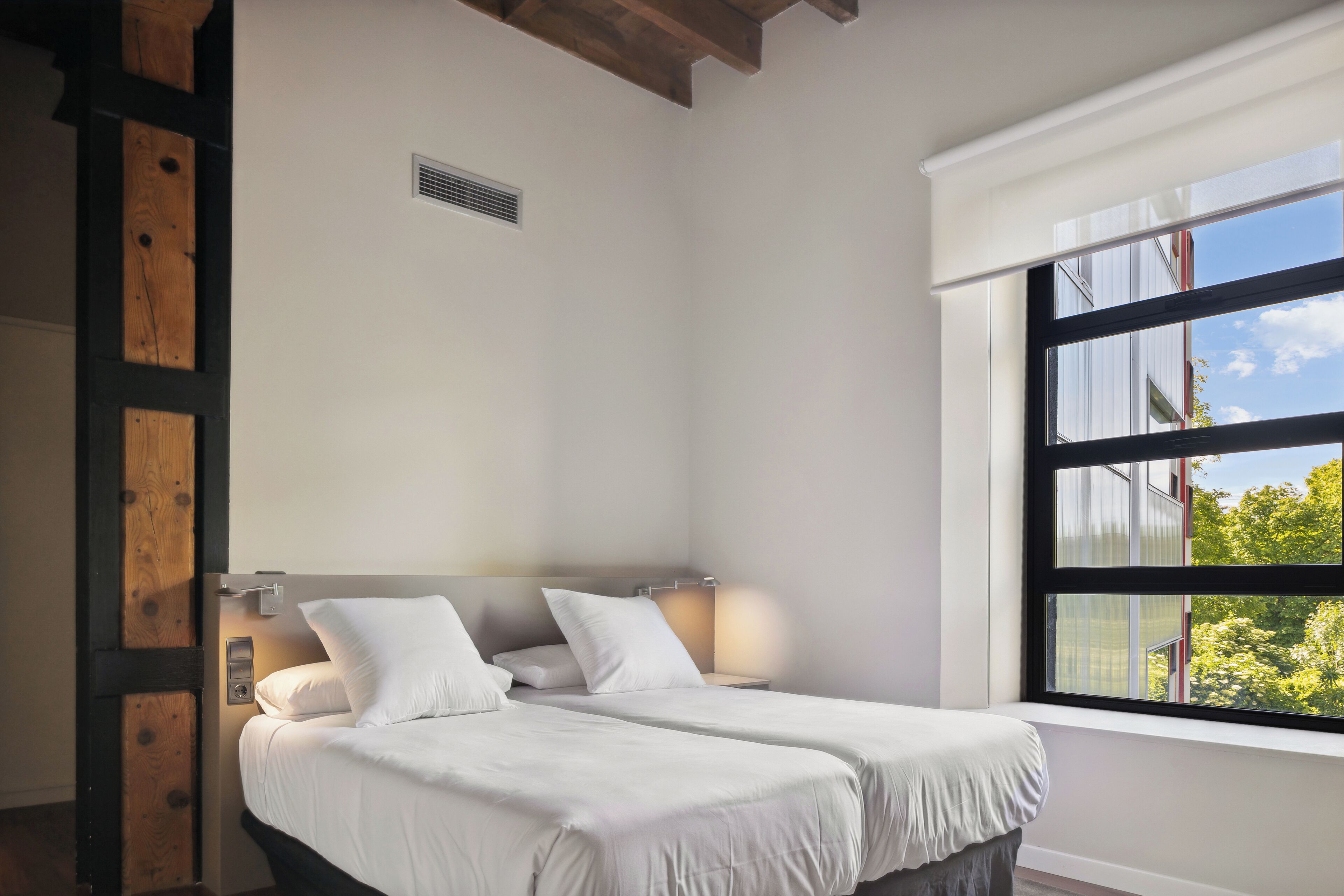 Twin kamer, uitzicht op tuin | Een kluis op de kamer, gratis wifi