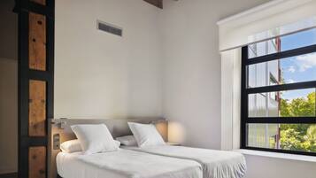 Twin kamer, uitzicht op tuin | Een kluis op de kamer, gratis wifi