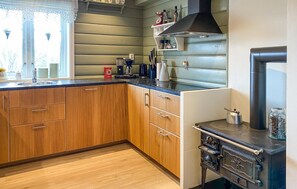 Fridge, stovetop, dishwasher, coffee/tea maker