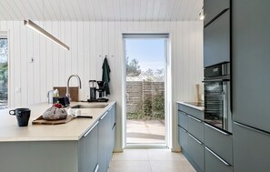 Fridge, dishwasher, coffee/tea maker