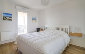 2 habitaciones, tabla de planchar con plancha y cuna de viaje