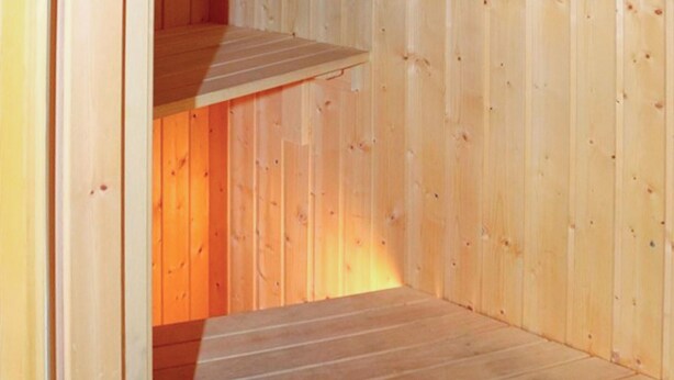 A wooden interior with a sloped ceiling and a visible wooden beam structure. - Nice apartment in Sälen with sauna (Sälen)