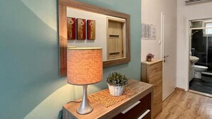 A bathroom with a toilet, a sink, and a mirror. - Lovely apartment in Vodice with WiFi (Vodice)