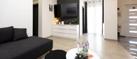 Smart TV, fireplace, foosball