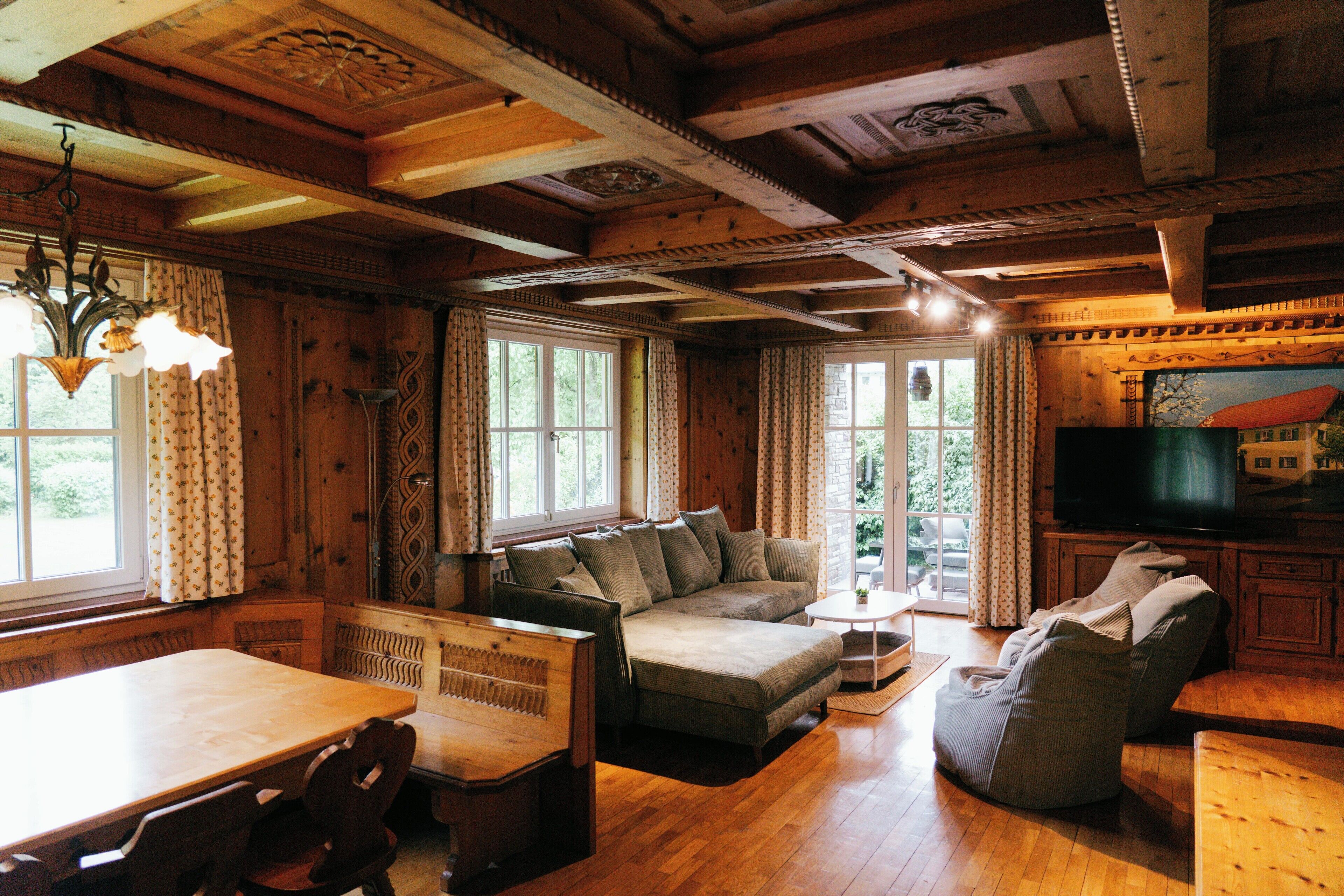 Comfort Apartment, 3 Bedrooms, Courtyard View | Living area | 50-inch flat-screen TV with cable channels