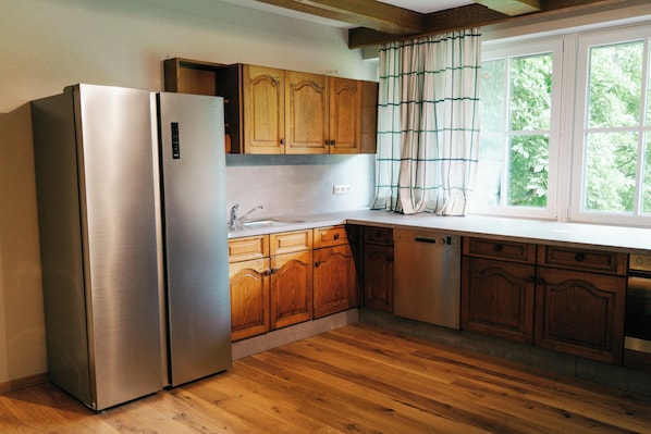 Comfort Apartment, 3 Bedrooms, Courtyard View | Private kitchen | Coffee/tea maker, electric kettle, highchair