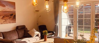 Vacation apartment Greetsiel Seezungenweg 11 D, central, quiet with garden