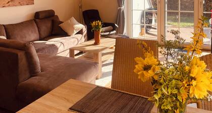 Vacation apartment Greetsiel Seezungenweg 11 D, central, quiet with garden