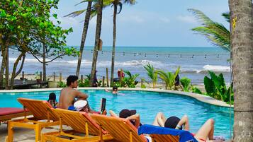 Outdoor pool, pool umbrellas, pool loungers