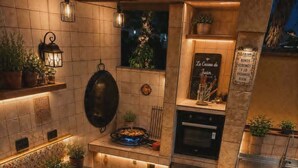 A compact kitchen with a stove, oven, and a dining area with a table and chairs. - Loft with Pool near Valencia and the Ricardo Tormo Circuit (VC)