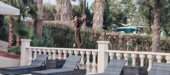 Loft in the villa, swimming pool, parking, enclosed garden.
