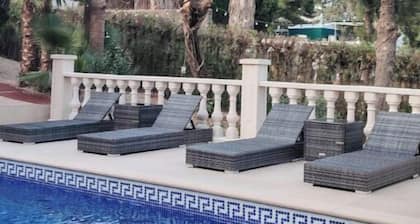 Loft in the villa, swimming pool, parking, enclosed garden.