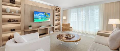 Suite de lujo, 1 habitación, cocina, vista al océano | Sala de estar | Televisión de pantalla plana de 55 pulgadas con canales por cable