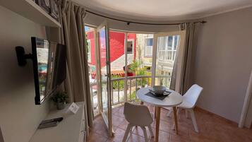 Standard Apartment, Beach View | 1 bedroom, in-room safe, individually decorated, individually furnished