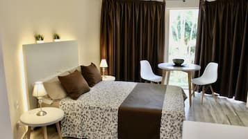 Standard Apartment, Beach View | 1 bedroom, in-room safe, individually decorated, individually furnished