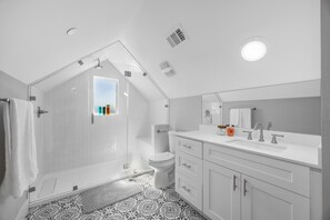 Hair dryer, towels, soap, shampoo
