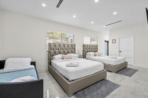 3 bedrooms, desk, iron/ironing board, travel crib