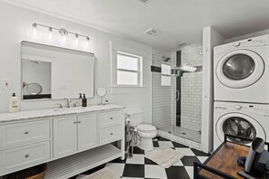 Shower, hair dryer, bidet, towels